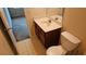 Bathroom with single vanity, toilet, and tile floor at 420 Berckman Nw Dr, Lilburn, GA 30047