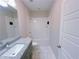 Bathroom featuring a white vanity with granite countertop and a shower-tub combination at 2005 Ocean Nw Dr, Atlanta, GA 30318