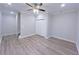 Large, light-filled bedroom with hardwood floors and trim and double closets at 2005 Ocean Nw Dr, Atlanta, GA 30318