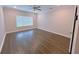 Empty bedroom featuring a ceiling fan, neutral color palette and window at 2005 Ocean Nw Dr, Atlanta, GA 30318
