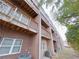 Brick exterior with multiple levels of patios and well-maintained landscaping at 2005 Ocean Nw Dr, Atlanta, GA 30318
