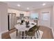 Eat-in kitchen featuring stainless steel appliances and white cabinetry at 2005 Ocean Nw Dr, Atlanta, GA 30318