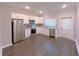 Kitchen with stainless steel appliances and white cabinets at 2005 Ocean Nw Dr, Atlanta, GA 30318