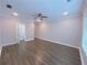 Empty living room featuring a ceiling fan, neutral color palette and window at 2005 Ocean Nw Dr, Atlanta, GA 30318