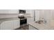 Bright kitchen features an island and modern appliances perfect for everyday living at 491 Reflection Dr # 33, Stockbridge, GA 30281