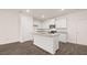 Bright kitchen features an island and modern appliances perfect for everyday living at 491 Reflection Dr # 33, Stockbridge, GA 30281