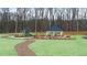 Walking path leads to the community playground and picnic pavilion, creating a vibrant recreation area at 491 Reflection Dr # 33, Stockbridge, GA 30281