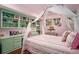 Pink bedroom with built in desk and canopy bed at 1225 W Wesley Nw Rd, Atlanta, GA 30327