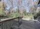 Wooden deck overlooks a wooded backyard at 2538 Gordon Se Cir, Smyrna, GA 30080