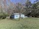 Cute blue house with front deck and yard at 2538 Gordon Se Cir, Smyrna, GA 30080