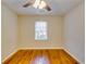 Spacious bedroom featuring hardwood floors and a window at 4685 Ruby Ln, Forest Park, GA 30297