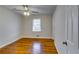 Well-lit bedroom, featuring hardwood floors at 4685 Ruby Ln, Forest Park, GA 30297