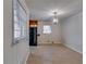 Simple dining room with wood flooring and light walls at 4685 Ruby Ln, Forest Park, GA 30297