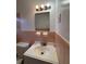 Bathroom with vanity sink and pink tile at 2069 Bixler Cir, Decatur, GA 30032