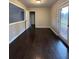 Dining room with dark hardwood floors and backyard access at 2069 Bixler Cir, Decatur, GA 30032