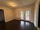 Dining room with dark hardwood floors and backyard access at 2069 Bixler Cir, Decatur, GA 30032