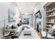 Contemporary living room with hardwood floors, fireplace, and built-in shelving at 3101 Howell Mill Nw Rd # 327, Atlanta, GA 30327