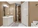 Bathroom featuring a double vanity, large shower, and tile floors at 4511 Balmoral Nw Rd, Kennesaw, GA 30144