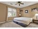 Bedroom features a large window and a ceiling fan for comfort and natural light at 4511 Balmoral Nw Rd, Kennesaw, GA 30144