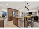 Open kitchen featuring an island, stainless steel appliances, and granite countertops at 4511 Balmoral Nw Rd, Kennesaw, GA 30144