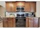 Well-equipped kitchen with granite countertops, stainless steel appliances, and ample cabinet space at 4511 Balmoral Nw Rd, Kennesaw, GA 30144