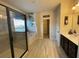 Main bathroom with glass shower, soaking tub, and neutral tile at 1124 Kingston Hill Dr, Loganville, GA 30052