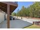 View of the townhome backyard and rear entry garages at 161 Brush Creek Ct, Stockbridge, GA 30281