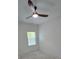 Bright bedroom with a lighted ceiling fan and a view from the window at 161 Brush Creek Ct, Stockbridge, GA 30281