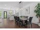 Spacious dining room with dark wood floors and plenty of room for entertaining at 161 Brush Creek Ct, Stockbridge, GA 30281