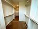 Walk-in closet offering ample storage with shelving and hanging space at 1995 Catnap Ct, Chamblee, GA 30341