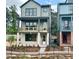 Charming two-story home with a welcoming front porch and black metal fence at 1995 Catnap Ct, Chamblee, GA 30341