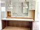 Bright kitchen featuring white cabinets, stainless steel sink, and kitchen island at 1995 Catnap Ct, Chamblee, GA 30341
