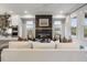 Cozy living room boasting a modern fireplace, white walls, and large windows at 1995 Catnap Ct, Chamblee, GA 30341