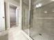 Bathroom featuring a shower and access to a walk-in closet at 5415 Rock Place Ct # 36, Norcross, GA 30093