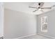 A calming bedroom with a ceiling fan and a window at 508 Sutters Mill Rd, Stone Mountain, GA 30087