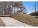 View of home and driveway, with two-car garage at 508 Sutters Mill Rd, Stone Mountain, GA 30087