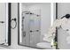 Bathroom mirror with smart features, modern hardware, and contemporary finishes at 165 Brush Creek Ct, Hampton, GA 30281
