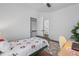 Comfortable bedroom with stylish decor and a view into the closet, ideal for a restful atmosphere at 165 Brush Creek Ct, Hampton, GA 30281