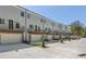 Exterior view of a modern apartment building at 165 Brush Creek Ct, Hampton, GA 30281