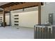 Exterior view of garage doors with a modern design at 165 Brush Creek Ct, Hampton, GA 30281