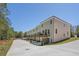 View of the exterior of a modern apartment building at 165 Brush Creek Ct, Hampton, GA 30281