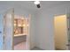 The living room has an open doorway to the kitchen and natural light at 165 Brush Creek Ct, Hampton, GA 30281