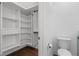 Walk-in closet with built-in shelving and dedicated space for storage at 165 Brush Creek Ct, Hampton, GA 30281