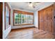 Cozy bedroom featuring hardwood floors, natural wood trim and accents and lots of natural light at 355 Clark Creek Pass, Acworth, GA 30102