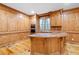 Rustic kitchen with custom cabinetry, granite countertops, and stainless steel appliances at 355 Clark Creek Pass, Acworth, GA 30102