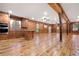 Large, open living room featuring natural wood accents, hardwood floors, and lots of natural light at 355 Clark Creek Pass, Acworth, GA 30102