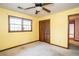 Spacious bedroom with ceiling fan and large closet at 714 Lanford Springs Sw Dr, Lilburn, GA 30047