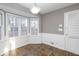 Bright dining room with bay window and tile floor at 714 Lanford Springs Sw Dr, Lilburn, GA 30047