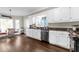 Bright kitchen features stainless steel appliances, granite countertops, and a cozy breakfast nook at 180 Paula Dr, Tyrone, GA 30290