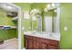 Double vanity bathroom with walk-in closet access at 104 Northcutt Station Pl, Acworth, GA 30101